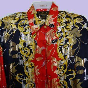 Aris. A women long sleeves shirt: 80% silk, 20% metallic Size S